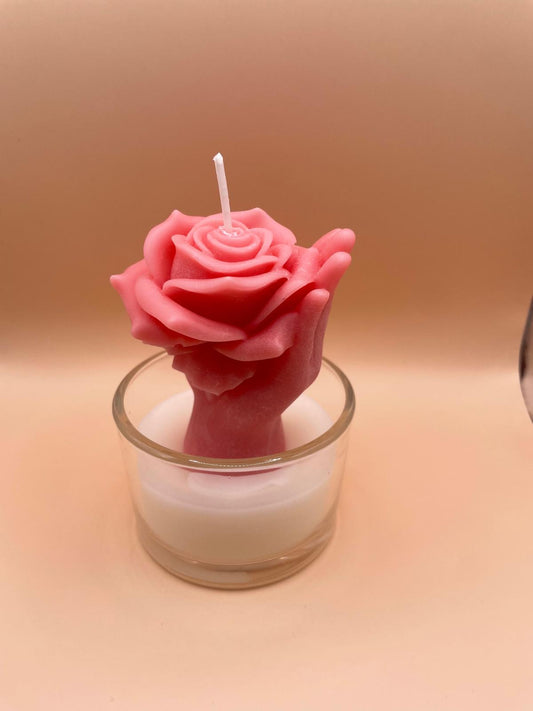 Hand Holding Rose Candle Jar